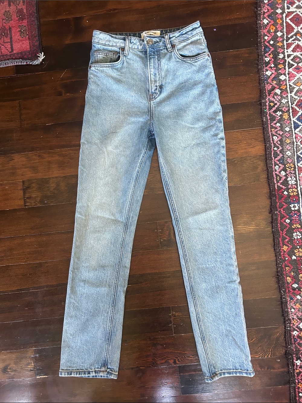 Reformation Liza ultra high rise slim straight jeans. 27